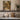 The Quiet Courtyard Wall Art in a White Floating Frame on a kitchen shelf