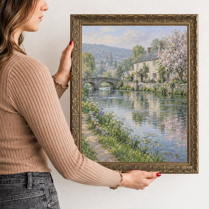 The River Inn Wall Art in a Gold Ornate Frame, held to show its size
