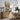The River Inn Wall Art in a Natural Floating Frame above an oak sideboard in a dining room