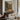 The Rose Gate Wall Art in a Black Floating Frame above a walnut console in a sitting room