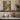 The Rose Walk Wall Art in a White Floating Frame on a kitchen shelf