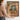 The Shuttered Balcony Wall Art in a Gold Ornate Frame, held to show its size