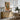 The Shuttered Balcony Wall Art in a Natural Floating Frame above an oak sideboard in a dining room