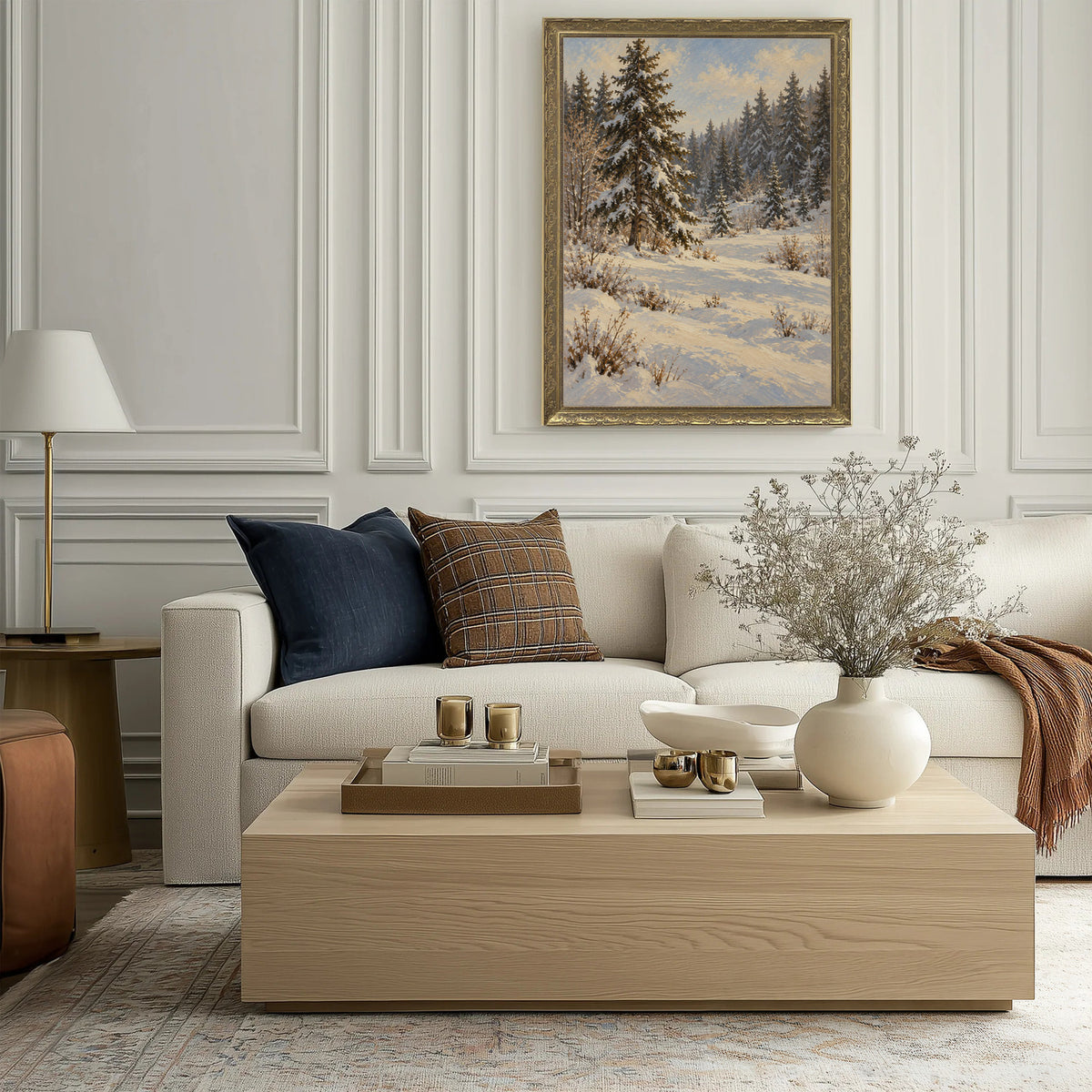 The Spruce Clearing Wall Art in a Gold Ornate Frame above a cream sofa in a living room