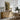 The Stone Basin Wall Art in a Natural Floating Frame above an oak sideboard in a dining room