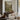 The Walled Garden Wall Art in a Black Floating Frame above a walnut console in a sitting room