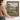 The Walled Garden Wall Art in a Gold Ornate Frame, held to show its size