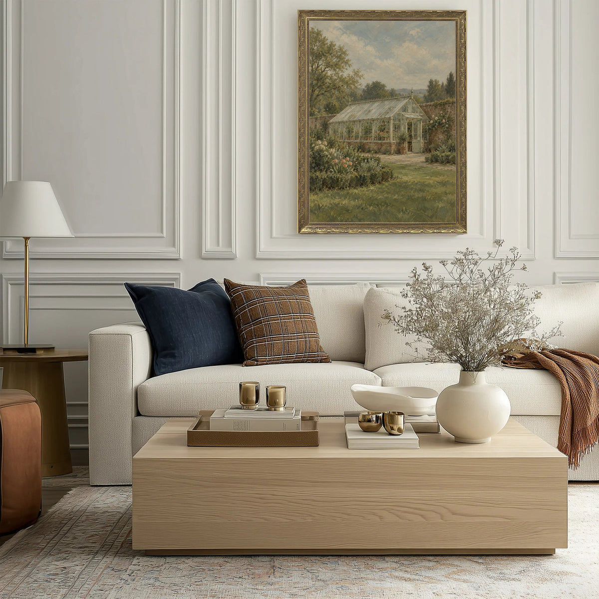 The Walled Garden Wall Art in a Gold Ornate Frame above a cream sofa in a living room