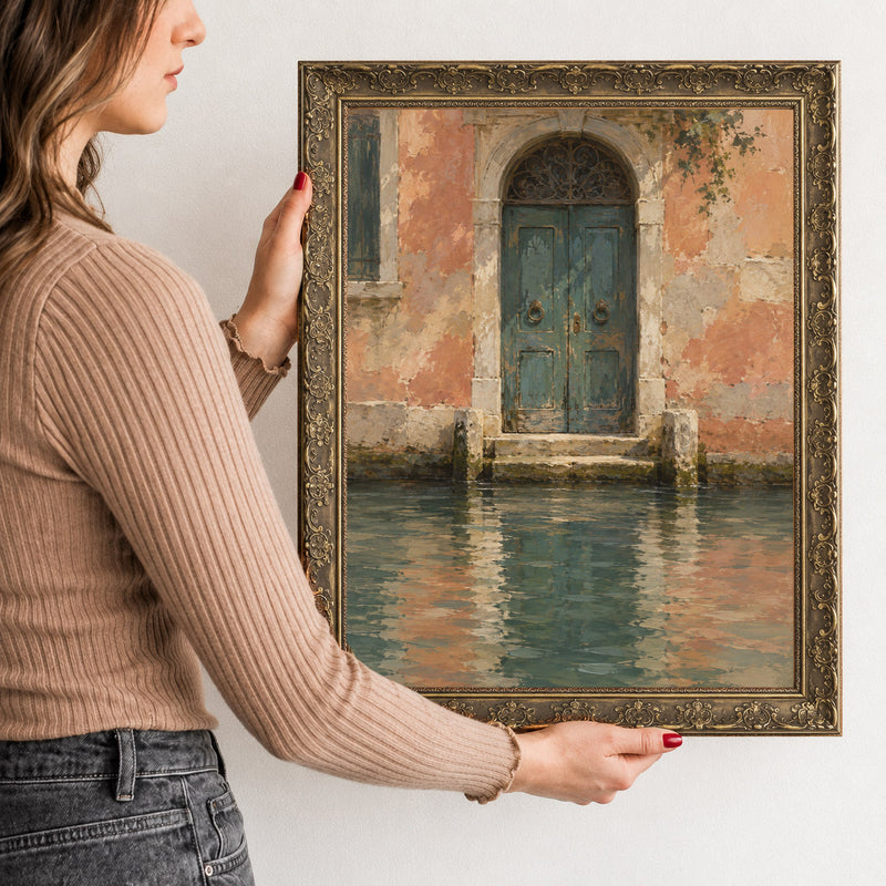 The Water Door Wall Art in a Gold Ornate Frame, held to show its size