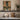 The Water Door Wall Art in a White Floating Frame on a kitchen shelf