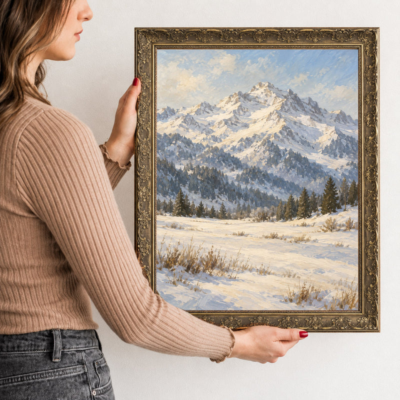The Winter Peak Wall Art in a Gold Ornate Frame, held to show its size
