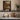 Through the Mill Window Wall Art in a Black Floating Frame on a kitchen shelf
