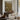 Wildflowers at the Rock Wall Art in a Black Floating Frame above a walnut console in a sitting room