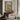 Window Above the River Wall Art in a Gold Ornate Frame above a walnut console in a sitting room